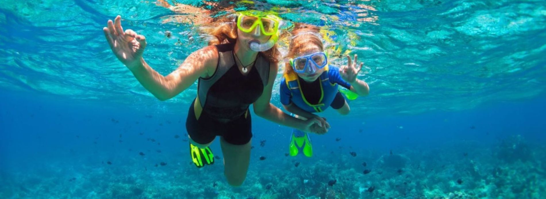 Two children snorkeling in Siesta Key, FL