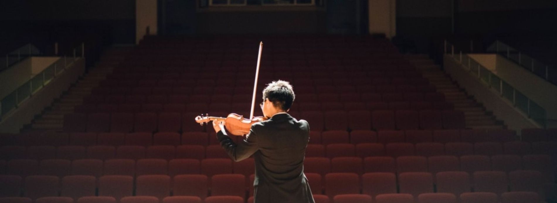 Violinist playing at a Sarasota Theatre