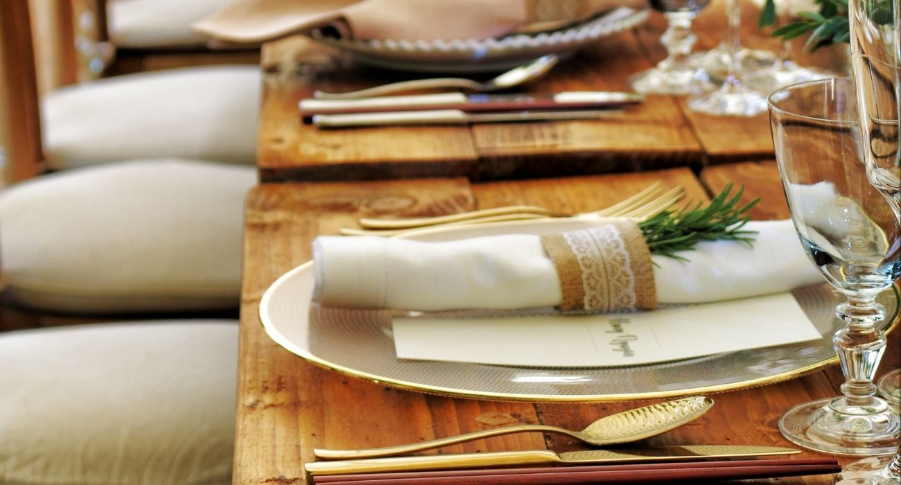 rustic table setting and gold silverware
