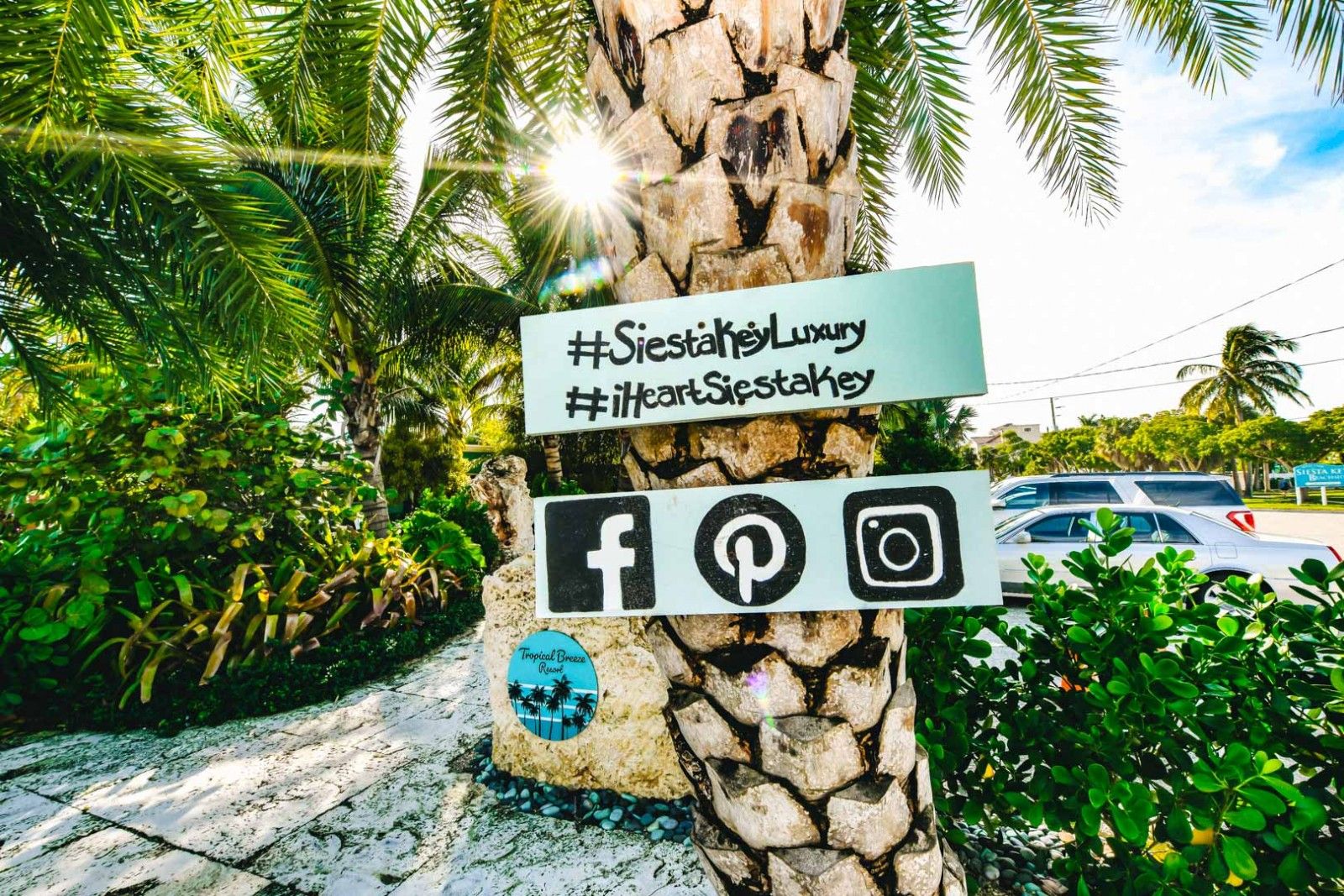 tropical breeze resort social media sign