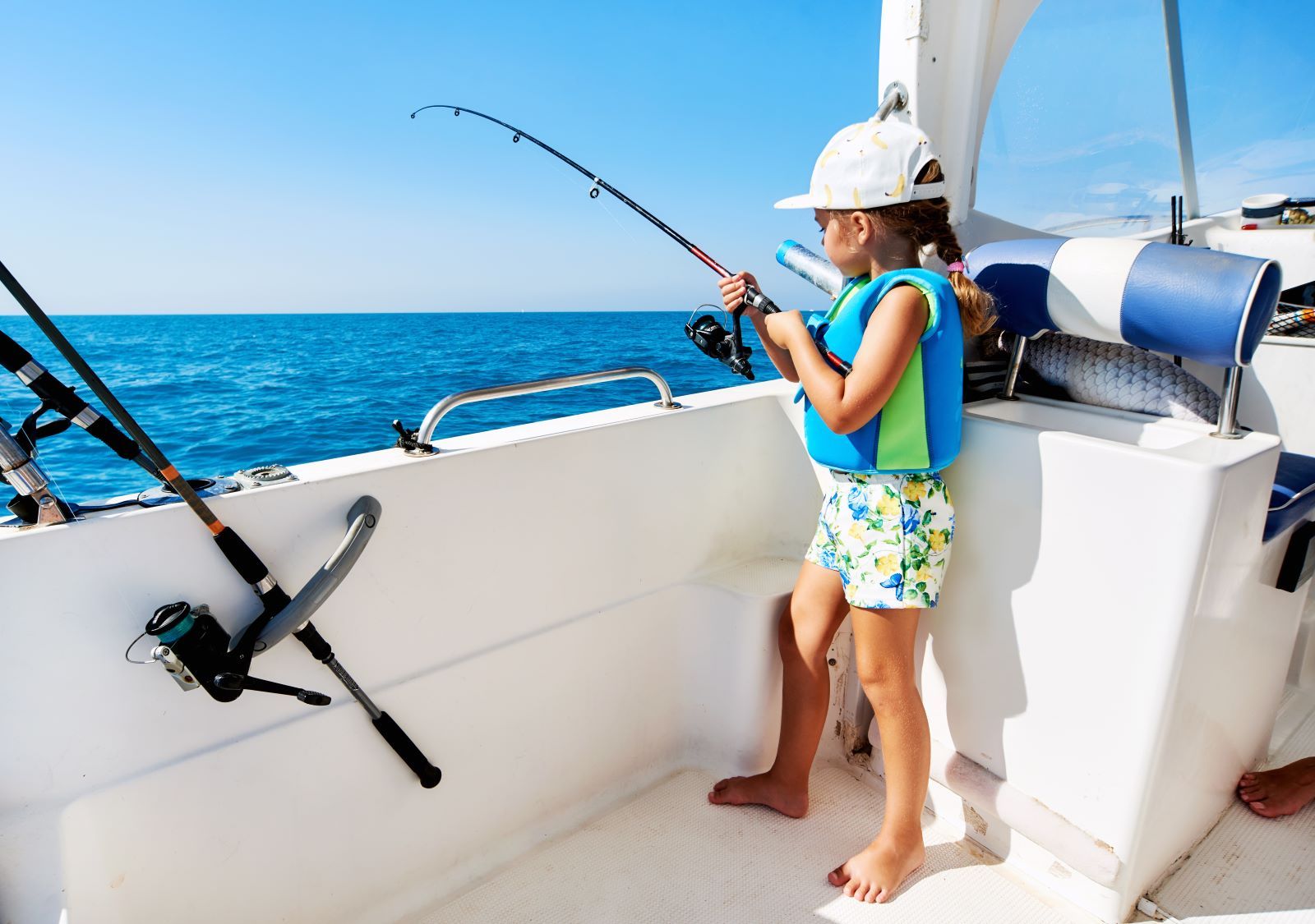 little girl on fishing charter in siesta key